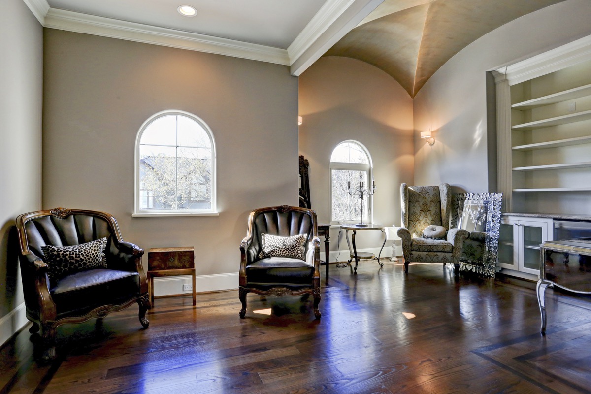 Master bedroom sitting area features quadripartite groin-vault ceiling